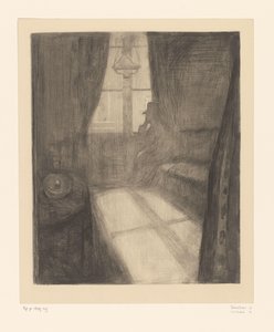 Mann in einem Interieur sitzend am Fenster