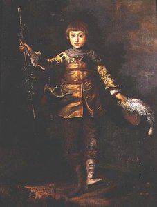 Porträt eines jungen Jungen, der in einem Wald tanzt