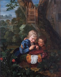 Jungen mit einem gefangenen Vogel