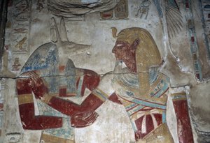 Bemaltes Relief, das den Pharao und den Gott Anubis darstellt, Kapelle des Osiris, Tempel von Sethos I. von Egyptian 19th Dynasty