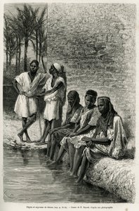 Neger und Negerinnen der Sahara, am Ufer des Oued Rihr. Gravur von E. Bayard, zur Illustration der algerischen Sahara, von V. Largeau, in den Jahren 1874-1878, veröffentlicht in Le Tour du Monde, unter der Leitung von Edouard Charton von Emile Antoine Bayard