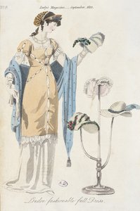 Englische Modeplatte, die eine junge Frau zeigt, die einen Hut auswählt, 1812