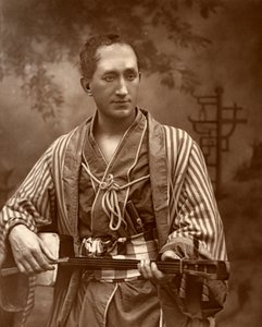 Durward Lely, schottischer Opernsänger, in Gilbert und Sullivans The Mikado von Ernest Barraud