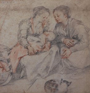 Zwei Frauen und ein Baby mit einer Katze