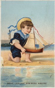 Junge spielt mit Spielzeugsegelboot von French School