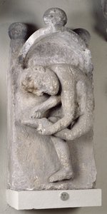 Relief, das einen Mann zeigt, der einen Dorn aus seinem Fuß entfernt