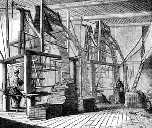 Seidenweber in einer Werkstatt in Lyon, die einen Jacquard-Webstuhl benutzen, ca. 1880