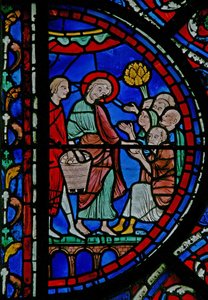 Das St. Thomas Fenster: Brotverteilung an die Armen