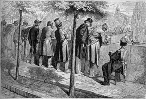 Ein "Bouquiniste" (Buchverkäufer) an den Ufern der Seine in Paris