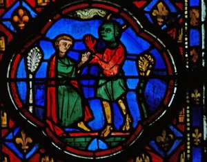 Fenster Ew-R, Theophilus mit einem Teufel darstellend
