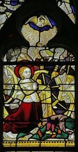 Fenster mit Darstellung der betenden Heiligen Katharina und Engeln, die das Rad durch Steinwürfe zerbrechen, 1460-70 von French School
