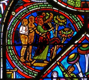 Fenster w15 zeigt das Fenster des barmherzigen Samariters: Gott weist Adam und Eva auf die verbotene Frucht hin von French School