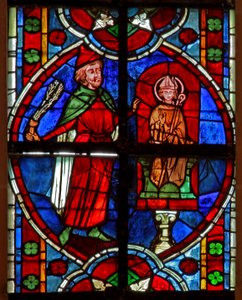 Fenster w209 zeigt die Statue des Heiligen Nikolaus (vor der oft Geldgeschäfte arrangiert wurden): Ein Jude, der Geld verloren hat, schlägt die Statue
