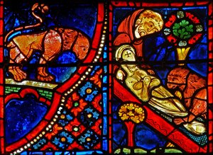 Fenster w21 zeigt einen Löwen, der Zosimus hilft, St. Maria die Ägypterin zu begraben