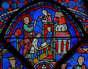 Fenster w23 mit einer Szene aus dem Leben des Heiligen Thomas: der Heilige baut eine Kirche von French School