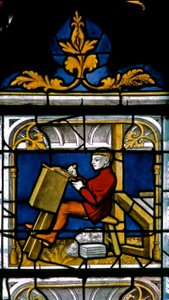 Fenster w25 zeigt einen Tuchhändler bei der Arbeit im Tuchhändlerfenster von French School