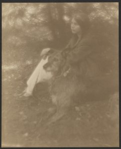Sitzende Frau mit Hund von George H. Seeley