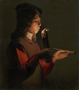 Ein Junge mit einer Pfeife, der auf einen Feuerbrand bläst von Georges de La Tour