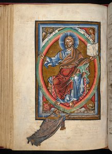 Christus sitzt in Majestät auf einem Thron innerhalb einer Mandorla, umgeben von den vier Symbolen der Evangelisten, aus 