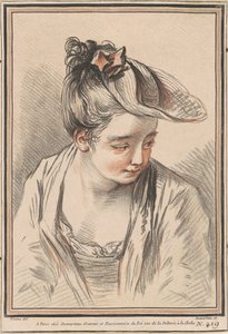 Kopf einer jungen Frau mit Hut