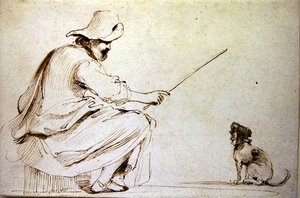 Ein sitzender Mann, der einen Hund trainiert