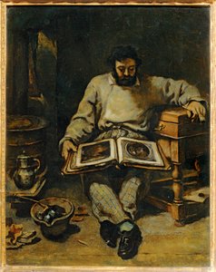 Philosoph Marc Trapadoux untersucht ein Buch mit Drucken von Gustave Courbet