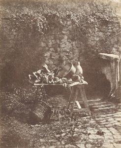 Stillleben: Kessel, Krug und Gemüse auf einem Tisch mit Böcken von Henri Victor Regnault