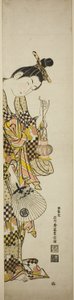 Eine Kurtisane hält eine Laterne und einen Fächer von Ishikawa Toyonobu