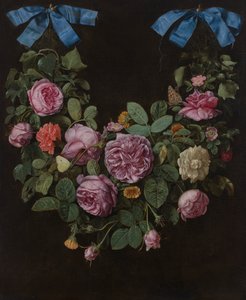 Ein Rosenkranz, der an blauen Bändern hängt