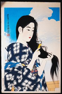 Junge Frau kämmt ihr Haar von Japanese School