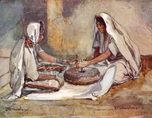 Zwei Frauen mahlen an einer Handmühle von John Fulleylove