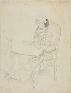 Sitzende junge Frau beim Lesen