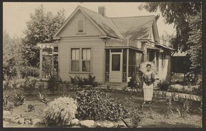 [Frau im Garten] von Louis Fleckenstein