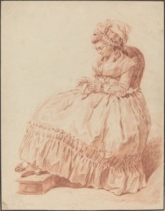 Sitzende Frau beim Nähen