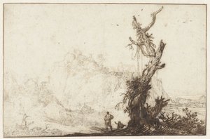 Berglandschaft mit einem kahlen Baum im Vordergrund