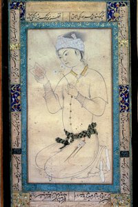 Ein junger Mann mit Büchern und Narzissen von Muhammad Shaykh
