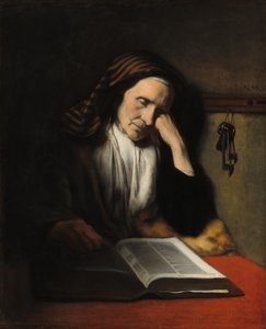 Eine alte Frau, die über einem Buch döst