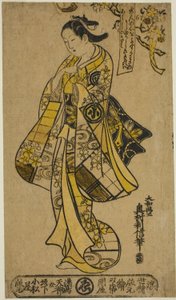 Der Schauspieler Arashi Wakano als Frau unter einem Kirschbaum stehend