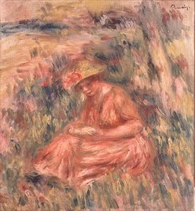 Frau sitzt auf dem Gras