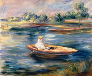 Junge Frau, die in einem Ruderboot sitzt