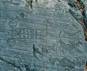 Prähistorie: Camunni-Zivilisation: ein von Pferden gezogener Wagen, Räder sind mit Speichen dargestellt und Pferde sind im Profil in einem Versuch der Perspektive. Felsgravur von Fels 23 von Naquane (Valcamonica, Val Camonica, Brescia). Zeitraum zwischen N von Prehistoric Prehistoric