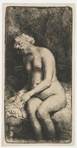 Frau badet ihre Füße in einem Bach von Rembrandt van Rijn