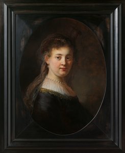 Junge Frau in Fantasiekostüm von Rembrandt van Rijn