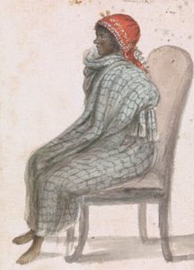 Afrikanische Frau, die auf einem Stuhl sitzt