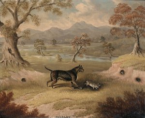 Charley, ein Terrier mit einem Kaninchen