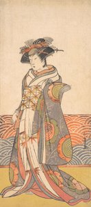 Der dritte Segawa Kikunojo als Frau, die in einem Raum mit Wellenmuster-Dado steht, ca. 1779