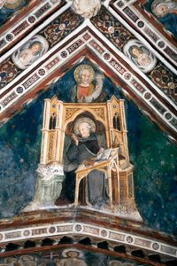 Detailansicht eines Freskos, das eines der Gewölbe der Oberkirche schmückt und die vier Ärzte der römischen Kirche darstellt: Hieronymus und der Evangelist Lukas. Gemacht von der Schule von Siena Anfang des 14. Jahrhunderts. Kloster von