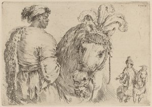 Ein schwarzer Mann füttert ein Pferd
