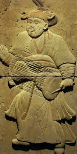 Terrakotta-Stele mit Musiker, Tang-Dynastie (618-907), entdeckt in der Provinz Shaanxi, Stelenwald-Museum in Xian. Fotografie, Leonard de Selva, China, 2006.