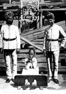 Ein Kuli im Pranger, Hongkong, 1908
